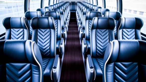 bend 55 passenger charter bus inside